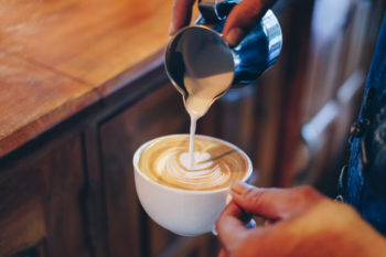 person making a latte