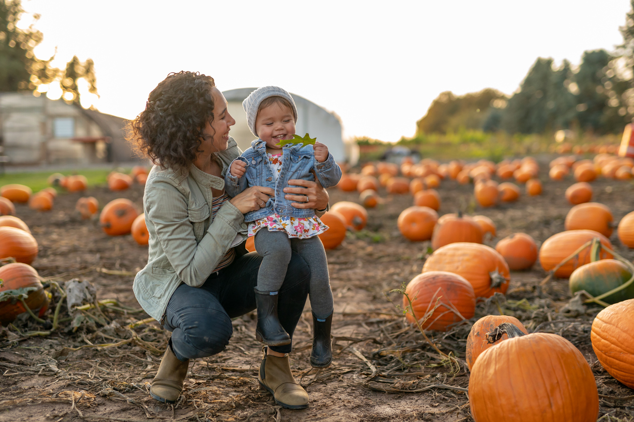 mother and child at a pumpkin patch | fall events in Highlands Ranch